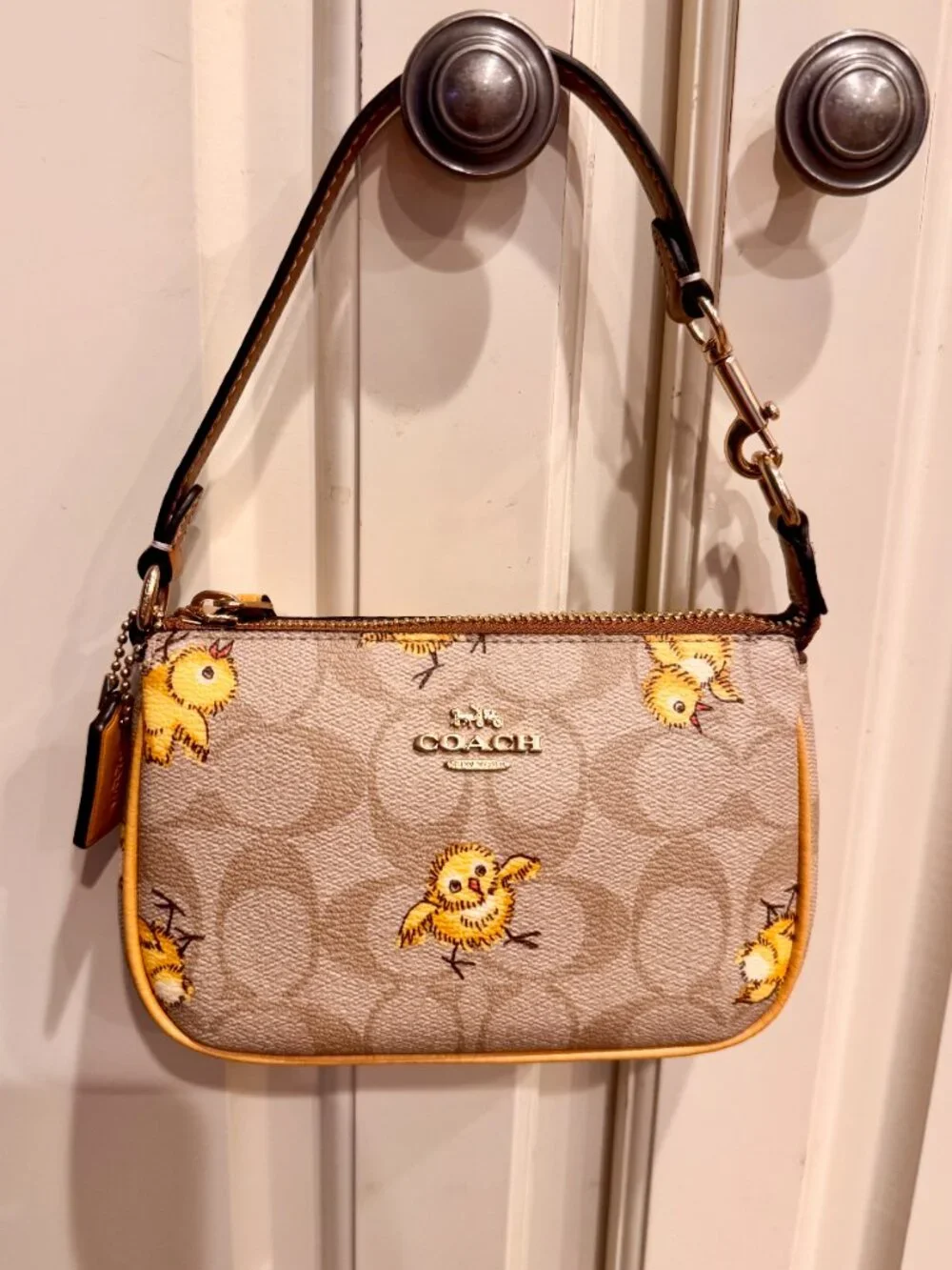 Coach Nolita Signature Canvas Wristlet Chick Print CC419